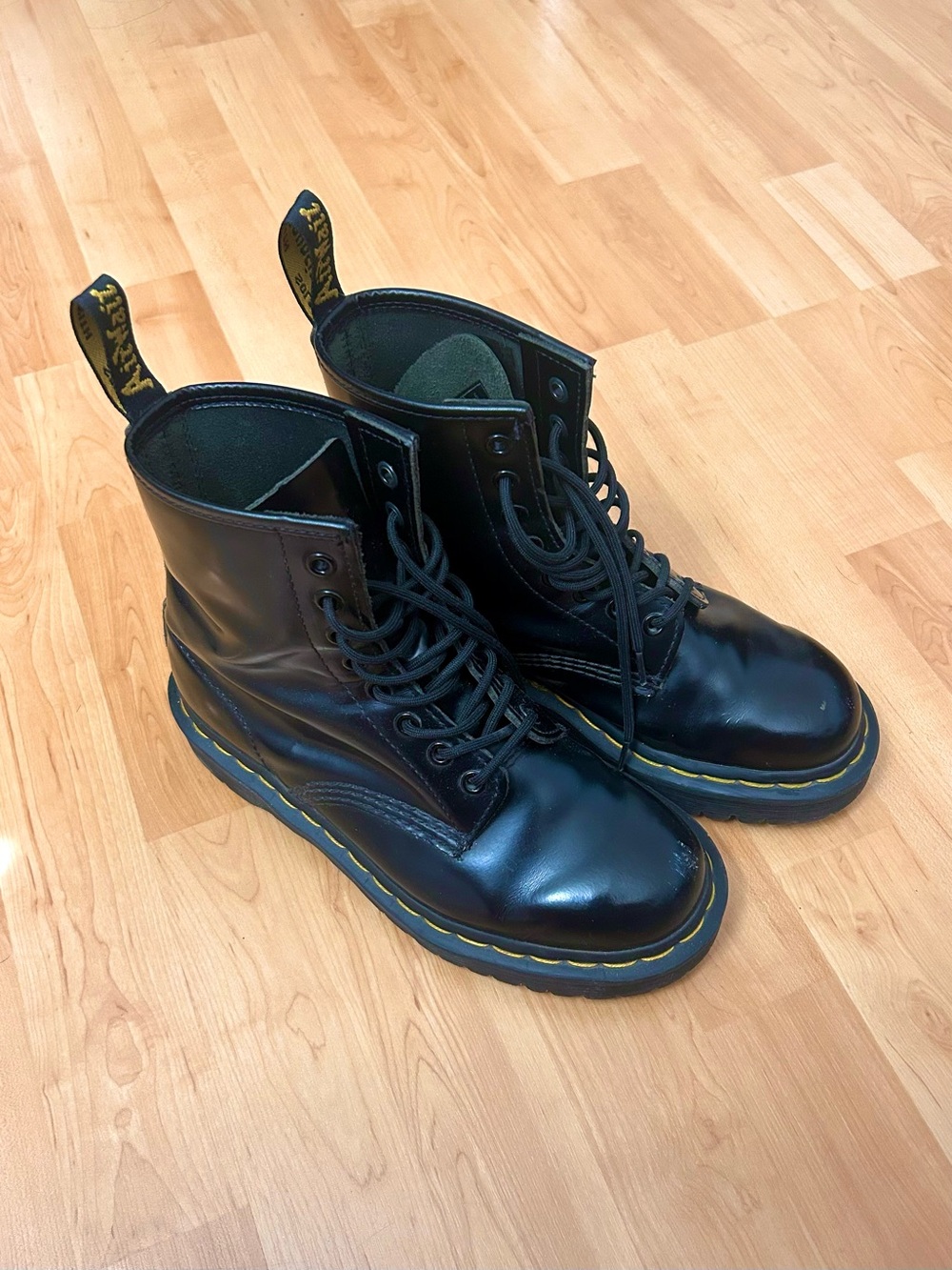 Dr. Martens Black Leather 8-Eye Lace-Up Boots with Yellow Stitching